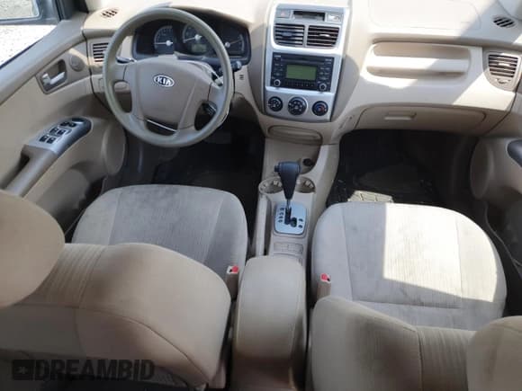 ✅ 2009 Kia Sportage EX • VIN: KNDJF723797626989 • Lot: 55327225. Wystawiony na Copart z przebiegiem 113 828 mil. Bezpłatny archiwum sprzedaży aukcyjnych z USA i szczegółowy raport historii pojazdu na DreamBid. Zdjęcie 8.