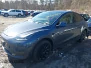 ✅ 2023 Tesla Model Y Long Range • VIN: 7SAYGAEE9PF905943 • Lot: 41444255. Listed on IAAI with 11,179 mi. Free auction sales archive from the USA and detailed vehicle history report at DreamBid. Image 2.