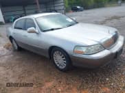 ✅ 2004 Lincoln Town Car Signature • VIN: 1LNHM81WX4Y662048 • Lot: 43306938. Listed on IAAI with 143,979 mi. Free auction sales archive from the USA and detailed vehicle history report at DreamBid. Image 1.