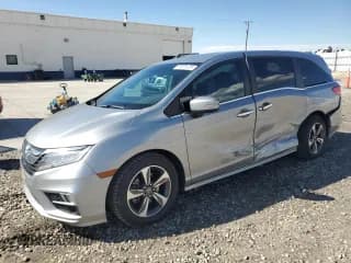 ✅ 2019 Honda Odyssey Touring • VIN: 5FNRL6H8XKB083758 • Lot: 82373125. Listed on Copart with 96,448 mi. Free auction sales archive from the USA and detailed vehicle history report at DreamBid. Image 1.