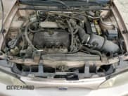 ✅ 1999 Ford Escort SE • VIN: 3FAFP15P0XR167167 • Lot: 52094765. Wystawiony na Copart z przebiegiem 154 960 mil. Bezpłatny archiwum sprzedaży aukcyjnych z USA i szczegółowy raport historii pojazdu na DreamBid. Zdjęcie 11.