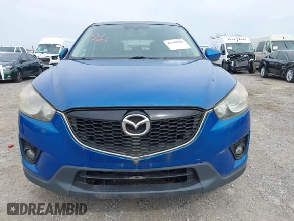 ✅ 2013 Mazda CX-5 Grand Touring • VIN: JM3KE2DE0D0100155 • Lot: 43341585. Listed on IAAI with 297,809 mi. Free auction sales archive from the USA and detailed vehicle history report at DreamBid. Image 12.