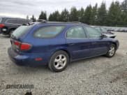 ✅ 2000 Ford Taurus SE • VIN: 1FAFP58S1YG179215 • Lot: 49731145. Listed on Copart with 97,128 mi. Free auction sales archive from the USA and detailed vehicle history report at DreamBid. Image 3.