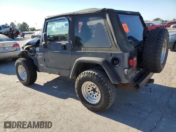 ✅ 2002 Jeep Wrangler X • VIN: 1J4FA39SX2P717023 • Lot: 85880575. Listed on Copart with 198,310 mi. Free auction sales archive from the USA and detailed vehicle history report at DreamBid. Image 2.