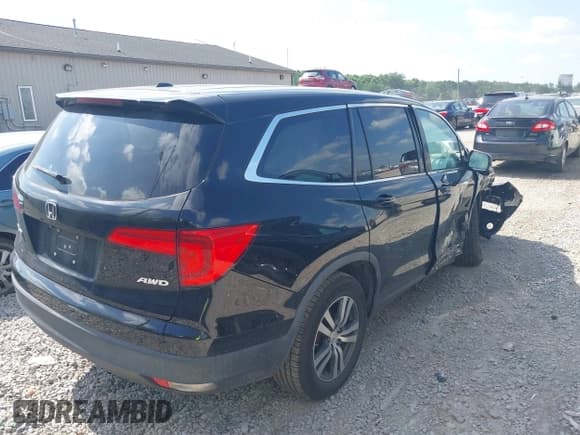 ✅ 2017 Honda Pilot EX-L • VIN: 5FNYF6H50HB083964 • Lot: 42658688. Listed on IAAI with 128,689 mi. Free auction sales archive from the USA and detailed vehicle history report at DreamBid. Image 4.