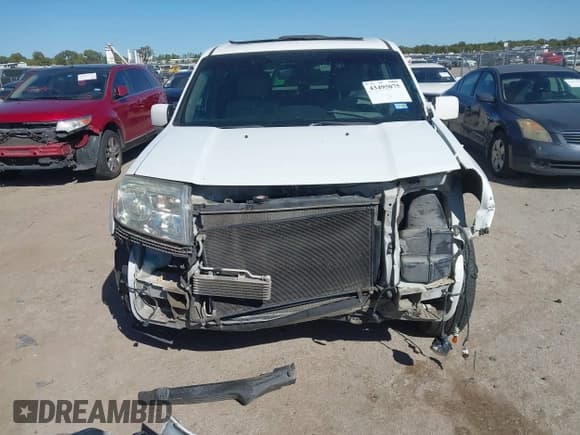 ✅ 2014 Honda Pilot EX-L • VIN: 5FNYF4H50EB037373 • Lot: 43495075. Listed on IAAI with 208,220 mi. Free auction sales archive from the USA and detailed vehicle history report at DreamBid. Image 12.