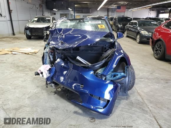 ✅ 2022 Tesla Model Y Performance • VIN: 7SAYGDEF4NF509913 • Lot: 86508585. Wystawiony na Copart z przebiegiem Nie podano. Bezpłatny archiwum sprzedaży aukcyjnych z USA i szczegółowy raport historii pojazdu na DreamBid. Zdjęcie 5.