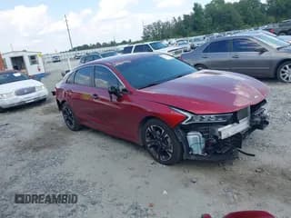 ✅ 2021 Kia K5 GT-Line • VIN: 5XXG64J21MG028642 • Лот: 43244458. Опубликован ранее на IAAI с пробегом 83 217 миль. Бесплатный доступ к архиву аукционных продаж из США и подробный отчёт об истории автомобиля на DreamBid. Изображение 1.