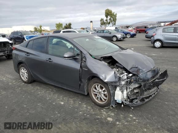 ✅ 2021 Toyota Prius LE • VIN: JTDKAMFU8M3139126 • Lot: 87396285. Listed on Copart with 243,893 mi. Free auction sales archive from the USA and detailed vehicle history report at DreamBid. Image 4.