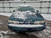 ✅ 1995 Ford Taurus GL • VIN: 1FALP52U3SA284796 • Lot: 95103725. Wystawiony na Copart z przebiegiem 117 343 mil. Bezpłatny archiwum sprzedaży aukcyjnych z USA i szczegółowy raport historii pojazdu na DreamBid. Zdjęcie 5.