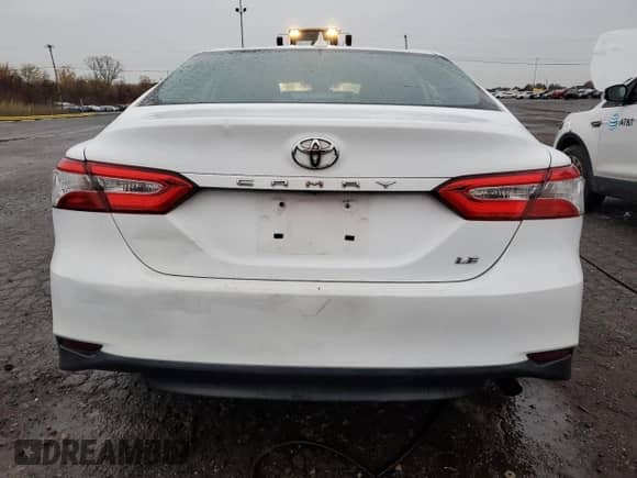 2020 Toyota Camry LE with VIN 4T1C11AK2LU861060, listed as a Copart auction lot 90739275 with 117,008 mi miles and Clean title. Bid and sale history available at DreamBid. Image 6.