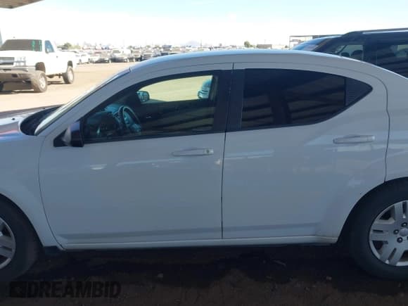 ✅ 2014 Dodge Avenger SE • VIN: 1C3CDZAG9EN220608 • Lot: 43577478. Listed on IAAI with 126,351 mi. Free auction sales archive from the USA and detailed vehicle history report at DreamBid. Image 15.