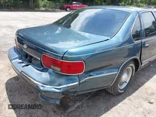 1996 Chevrolet Caprice 1SA Special Value z VIN 1G1BL52P2TR156203, wystawiony jako IAAI lot #42406399 z przebiegiem 65 914 mil mil oraz . Historia ofert i sprzedaży dostępna na DreamBid. Obrazek 6.