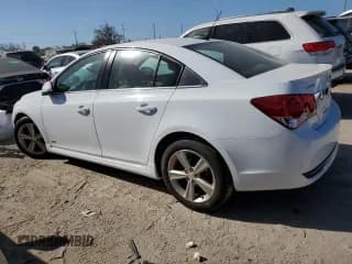 ✅ 2015 Chevrolet Cruze LT • VIN: 1G1PE5SBXF7103849 • Lot: 40605673. Listed on Copart with 96,616 mi. Free auction sales archive from the USA and detailed vehicle history report at DreamBid. Image 2.