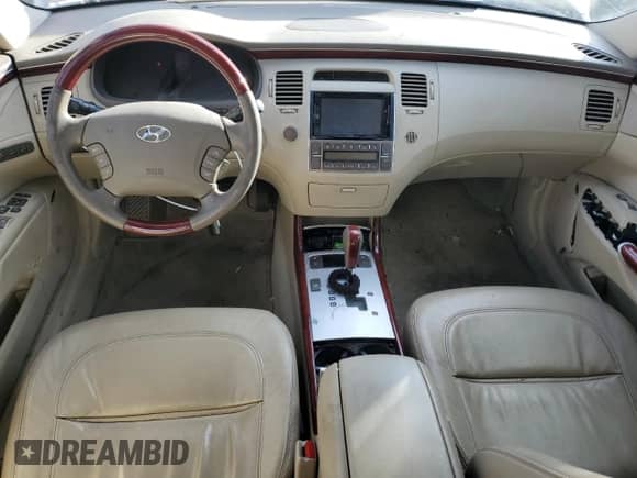 2007 Hyundai Azera SE с VIN KMHFC46F47A187747, выставлен на аукционе Copart как лот 80963194 с пробегом 113 742 миль миль и Списание • Salvage title. История ставок и продаж доступна на DreamBid. Изображение 8.