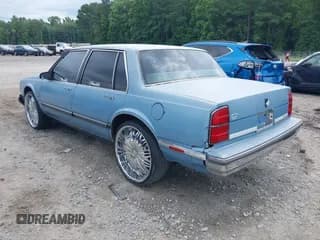 ✅ 1989 Oldsmobile Delta • VIN: 1G3HN54C1KW367706 • Лот: 42622660. Опубликован ранее на IAAI с пробегом 134 738 миль. Бесплатный доступ к архиву аукционных продаж из США и подробный отчёт об истории автомобиля на DreamBid. Изображение 3.