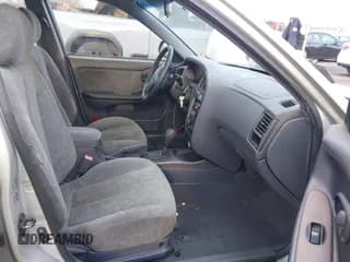 ✅ 2003 Hyundai Elantra GLS • VIN: KMHDN45D93U701294 • Lot: 41357640. Wystawiony na IAAI z przebiegiem 248 029 mil. Bezpłatny archiwum sprzedaży aukcyjnych z USA i szczegółowy raport historii pojazdu na DreamBid. Zdjęcie 5.