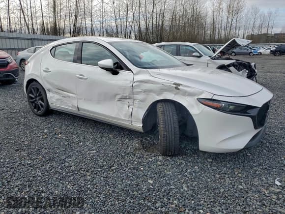 ✅ 2022 Mazda 3 Premium • VIN: JM1BPBMLXN1514556 • Lot: 94951195. Listed on Copart with 23,289 mi. Free auction sales archive from the USA and detailed vehicle history report at DreamBid. Image 4.