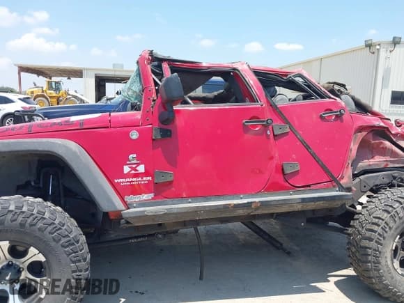 ✅ 2007 Jeep Wrangler X • VIN: 1J4GA39127L154527 • Lot: 42316655. Listed on IAAI with 126,124 mi. Free auction sales archive from the USA and detailed vehicle history report at DreamBid. Image 14.