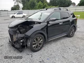 ✅ 2018 Hyundai Santa Fe Ultimate • VIN: 5XYZW4LA6JG527800 • Лот: 67731845. Опубликован ранее на Copart с пробегом 96 312 миль. Бесплатный доступ к архиву аукционных продаж из США и подробный отчёт об истории автомобиля на DreamBid. Изображение 1.