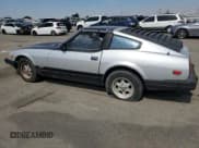 ✅ 1982 Datsun 280ZX • VIN: JN1HZ04SXCX448748 • Лот: 87670125. Опубликован ранее на Copart с пробегом 136 264 миль. Бесплатный доступ к архиву аукционных продаж из США и подробный отчёт об истории автомобиля на DreamBid. Изображение 2.