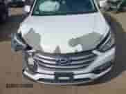 2018 Hyundai Santa Fe 2.4L z VIN 5NMZUDLB6JH078395, wystawiony jako IAAI lot #43277067 z przebiegiem 82 038 mil mil oraz . Historia ofert i sprzedaży dostępna na DreamBid. Obrazek 19.