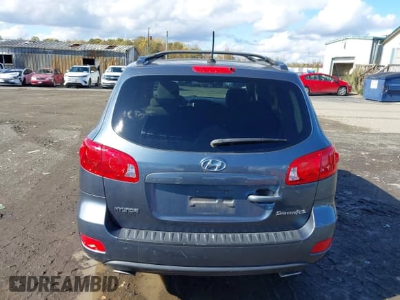 ✅ 2009 Hyundai Santa Fe Limited • VIN: 5NMSH13E09H238247 • Lot: 43574832. Listed on IAAI with 168,143 mi. Free auction sales archive from the USA and detailed vehicle history report at DreamBid. Image 16.