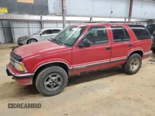 1995 Chevrolet Blazer z VIN 1GNDT13W2SK212802, wystawiony jako Copart lot #84792554 z przebiegiem 186 206 mil mil oraz Szkoda całkowita • Salvage title. Historia ofert i sprzedaży dostępna na DreamBid. Obrazek 1.