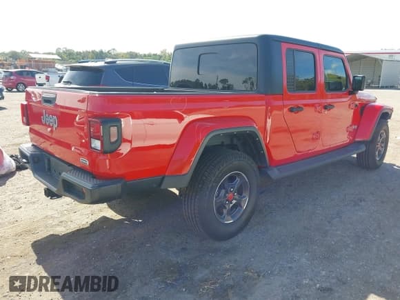 ✅ 2021 Jeep Gladiator Overland • VIN: 1C6HJTFG8ML587386 • Lot: 43663128. Listed on IAAI with 101,981 mi. Free auction sales archive from the USA and detailed vehicle history report at DreamBid. Image 4.