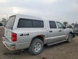 2006 Dodge Dakota SLT с VIN 1D7HW48N76S501902, выставлен на аукционе Copart как лот 77809914 с пробегом 129 075 миль миль и Списание • Salvage title. История ставок и продаж доступна на DreamBid. Изображение 3.