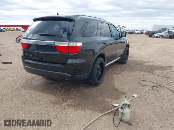 ✅ 2013 Dodge Durango SXT • VIN: 1C4RDHAG0DC571918 • Lot: 43203650. Listed on IAAI with 150,362 mi. Free auction sales archive from the USA and detailed vehicle history report at DreamBid. Image 4.