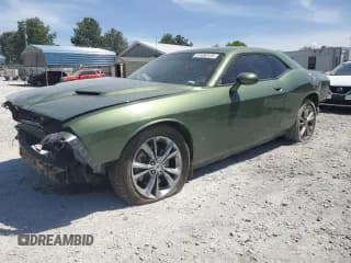 ✅ 2021 Dodge Challenger SXT • VIN: 2C3CDZGG9MH597566 • Lot: 51458134. Wystawiony na Copart z przebiegiem 74 609 mil. Bezpłatny archiwum sprzedaży aukcyjnych z USA i szczegółowy raport historii pojazdu na DreamBid. Zdjęcie 1.