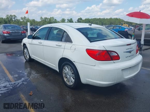 ✅ 2009 Chrysler Sebring Touring • VIN: 1C3LC56B19N507472 • Lot: 43023773. Listed on IAAI with 154,381 mi. Free auction sales archive from the USA and detailed vehicle history report at DreamBid. Image 3.