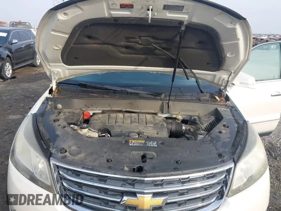 ✅ 2013 Chevrolet Traverse LTZ • VIN: 1GNKVLKD3DJ182084 • Lot: 43696089. Wystawiony na IAAI z przebiegiem 196 099 mil. Bezpłatny archiwum sprzedaży aukcyjnych z USA i szczegółowy raport historii pojazdu na DreamBid. Zdjęcie 10.