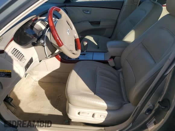 2006 Hyundai Azera SE z VIN KMHFC46F46A086416, wystawiony jako Copart lot #45264175 z przebiegiem 92 448 mil mil oraz Szkoda całkowita • Salvage title. Historia ofert i sprzedaży dostępna na DreamBid. Obrazek 7.