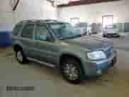 2006 Mercury Mariner Convenience with VIN 4M2YU56Z96DJ03164, listed as a Copart auction lot 69500635 with 212,923 mi miles and Salvage title. Bid and sale history available at DreamBid. Image 14.