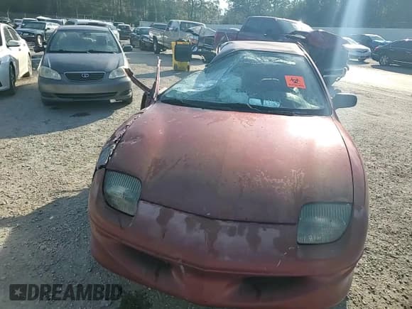 ✅ 1997 Pontiac Sunfire SE • VIN: 1G2JB5240V7537689 • Lot: 82835954. Listed on Copart with 95,860 mi. Free auction sales archive from the USA and detailed vehicle history report at DreamBid. Image 11.