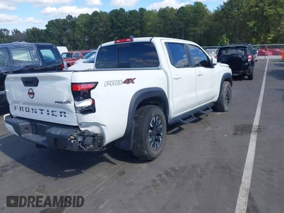 ✅ 2023 Nissan Frontier SV • VIN: 1N6ED1EKXPN630337 • Lot: 43387005. Listed on IAAI with 41,703 mi. Free auction sales archive from the USA and detailed vehicle history report at DreamBid. Image 4.
