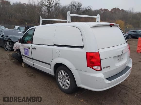 ✅ 2015 Ram Cargo Van Tradesman • VIN: 2C4JRGAG4FR701959 • Lot: 43722320. Listed on IAAI with 123,096 mi. Free auction sales archive from the USA and detailed vehicle history report at DreamBid. Image 3.