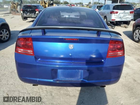 2006 Dodge Charger R/T with VIN 2B3KA53H76H521937, listed as a Copart auction lot 77455534 with 103,060 mi miles and Salvage title. Bid and sale history available at DreamBid. Image 6.