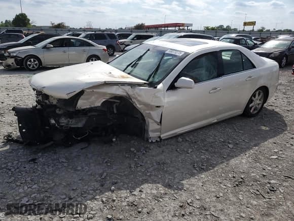 ✅ 2007 Cadillac STS • VIN: 1G6DW677570130889 • Lot: 58073275. Listed on Copart with 124,168 mi. Free auction sales archive from the USA and detailed vehicle history report at DreamBid. Image 1.