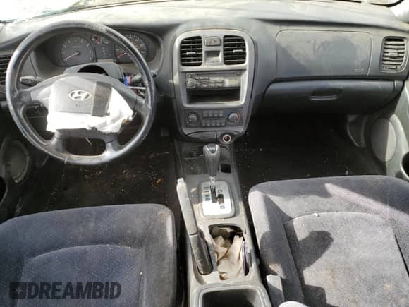 2004 Hyundai Sonata with VIN KMHWF25H14A925921, listed as a Copart auction lot 82651264 with 232,026 mi miles and Salvage title. Bid and sale history available at DreamBid. Image 8.