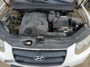 ✅ 2009 Hyundai Santa Fe GL 5Pass • VIN: 5NMSG13E29H259247 • Lot: 57111945. Listed on Copart with 261,283 mi. Free auction sales archive from the USA and detailed vehicle history report at DreamBid. Image 12.