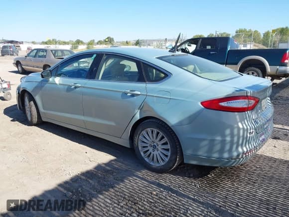 ✅ 2013 Ford Fusion SE Hybrid • VIN: 3FA6P0LU2DR148831 • Лот: 43282206. Опубликован ранее на IAAI с пробегом 160 117 миль. Бесплатный доступ к архиву аукционных продаж из США и подробный отчёт об истории автомобиля на DreamBid. Изображение 3.
