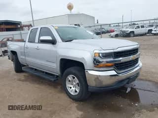 2018 Chevrolet Silverado 1500 LT z VIN 1GCRCREH8JZ299588, wystawiony jako IAAI lot #41890783 z przebiegiem 59 099 mil mil oraz . Historia ofert i sprzedaży dostępna na DreamBid. Obrazek 1.