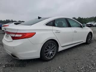 ✅ 2013 Hyundai Azera • VIN: KMHFH4JG2DA277122 • Лот: 59899755. Опубликован ранее на Copart с пробегом 210 601 миль. Бесплатный доступ к архиву аукционных продаж из США и подробный отчёт об истории автомобиля на DreamBid. Изображение 3.