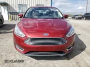 ✅ 2015 Ford Focus Titanium • VIN: 1FADP3N29FL215818 • Lot: 55442525. Wystawiony na Copart z przebiegiem 128 887 mil. Bezpłatny archiwum sprzedaży aukcyjnych z USA i szczegółowy raport historii pojazdu na DreamBid. Zdjęcie 5.