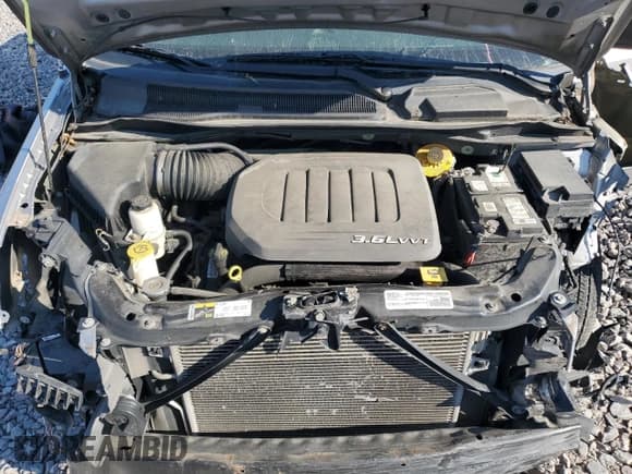 ✅ 2016 Dodge Grand Caravan SE • VIN: 2C4RDGBG4GR123024 • Lot: 71948705. Listed on Copart with 104,407 mi. Free auction sales archive from the USA and detailed vehicle history report at DreamBid. Image 12.