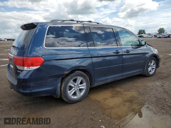 ✅ 2010 Honda Odyssey • VIN: 5FNRL3H81AB507082 • Лот: 62931535. Опубликован ранее на Copart с пробегом 328 109 миль. Бесплатный доступ к архиву аукционных продаж из США и подробный отчёт об истории автомобиля на DreamBid. Изображение 3.
