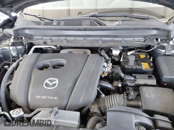 ✅ 2021 Mazda CX-5 Grand Touring • VIN: JM3KFADMXM1342413 • Lot: 41867153. Listed on IAAI with 38,519 mi. Free auction sales archive from the USA and detailed vehicle history report at DreamBid. Image 10.